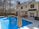 Inviting in-ground pool with expansive deck area, perfect for outdoor entertaining at 5122 Berkeley St, Raleigh, NC 27612
