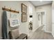 Hallway features a bench with wall art and modern decor at 557 Freedom Trail Dr, Willow Springs, NC 27592