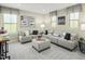 Spacious living room features a sectional sofa and bicycle-themed decor at 557 Freedom Trail Dr, Willow Springs, NC 27592
