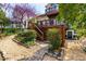 A two-tiered wood deck and landscaped backyard create a serene outdoor space at 620 Wills Forest St, Raleigh, NC 27605