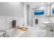 Bright, remodeled bathroom with soaking tub, glass shower, and pedestal sink at 620 Wills Forest St, Raleigh, NC 27605
