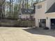 Spacious backyard with a detached garage and patio at 63 Tally Ho Dr, Selma, NC 27576