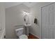Powder room features pedestal sink, updated fixtures, and neutral paint provides a simple yet practical design at 63 Tally Ho Dr, Selma, NC 27576