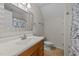 Cozy bathroom featuring a pedestal sink, shower and neutral finishes at 63 Tally Ho Dr, Selma, NC 27576