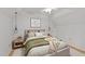 Well-lit bedroom with a comfortable bed, stylish lighting and neutral decor at 63 Tally Ho Dr, Selma, NC 27576
