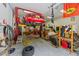 Garage interior with car on lift and tools at 63 Tally Ho Dr, Selma, NC 27576