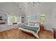 Spacious primary bedroom features vaulted ceilings, dual windows, and a walk-in closet at 63 Tally Ho Dr, Selma, NC 27576