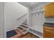 Mudroom features tile floors, storage space, and staircase at 63 Tally Ho Dr, Selma, NC 27576