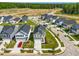 Aerial view of new neighborhood with modern homes and green spaces at 653 Corvair Ln, Wendell, NC 27591