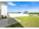 Well-maintained backyard with a concrete patio and a privacy fence at 653 Corvair Ln, Wendell, NC 27591