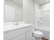 Bathroom featuring a shower-tub, toilet, vanity with sink, mirror and hardware at 653 Corvair Ln, Wendell, NC 27591