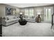 Comfortable living room featuring neutral colors, plush seating, and stylish decor, perfect for relaxation at 713 Tambor Rd, Durham, NC 27713