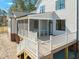 Exterior view of house featuring a back porch, deck, backyard, and siding at 7950 Country Knoll Rd, Bahama, NC 27503