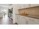 Modern kitchen with white cabinets, stainless steel appliances, and granite countertops, a chef's dream at 813 James J Freeland Dr, Hillsborough, NC 27278