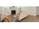 Cozy living room featuring a fireplace, plush seating, and natural light, creating a warm and inviting atmosphere at 813 James J Freeland Dr, Hillsborough, NC 27278