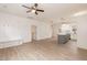 Open-concept living space features hardwood floors, kitchen, dining, and storage spaces at 100 Gates St, Roxboro, NC 27573