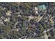 Aerial view of property located at 100 Lochberry Ln, surrounded by lush trees at 100 Lochberry Ln, Cary, NC 27518