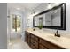 Bright bathroom with a double sink vanity and a window providing natural light at 100 Lochberry Ln, Cary, NC 27518