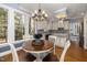 Cozy breakfast nook filled with natural light, perfect for casual dining and enjoying the outdoor view at 100 Lochberry Ln, Cary, NC 27518