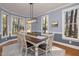 Dining room showcasing natural light, crown molding and a neutral color palette at 100 Lochberry Ln, Cary, NC 27518