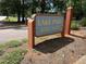 A sign marking a boat ramp entrance and Lake Park at 100 Lochberry Ln, Cary, NC 27518