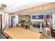 This basement features a pool table, lounge area with sofas, and a brick accent wall at 105 Elizabeth St, Chapel Hill, NC 27514