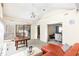 Bright sunroom with vaulted ceiling, ceiling fan, and a view of the backyard at 105 Elizabeth St, Chapel Hill, NC 27514