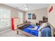 Bedroom featuring neutral carpet, a red and white dresser, and a ceiling fan at 109 S Fern Abbey Ln, Cary, NC 27518