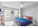 Bedroom with neutral colored carpet and anchor themed decor. and multiple windows at 109 S Fern Abbey Ln, Cary, NC 27518