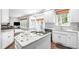 Stylish kitchen boasting stainless steel appliances, granite countertops, and an open layout at 109 S Fern Abbey Ln, Cary, NC 27518
