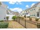 Lovely backyard features partial fence and lush landscaping at 109 Shale Creek Dr, Durham, NC 27703