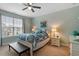 Serene bedroom with a comfortable bed, soft color palette, and natural light creating a peaceful retreat at 109 Shale Creek Dr, Durham, NC 27703