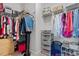 Walk-in closet featuring shelving and hanging storage space for organizing clothing and accessories at 109 Shale Creek Dr, Durham, NC 27703