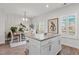 Bright dining area with large island and a sliding door at 1094 Ambergate Sta, Apex, NC 27502