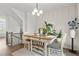 The bright dining room with a serving table and easy access to the deck at 1094 Ambergate Sta, Apex, NC 27502