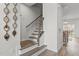 An entryway staircase leads to the living area, showing modern design at 1094 Ambergate Sta, Apex, NC 27502