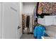 Walk-in closet with organized shelving and hanging rods, providing ample storage space at 1094 Ambergate Sta, Apex, NC 27502