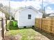 A full view of the backyard, fully fenced with a level yard and easy access at 1220 Garner Rd, Raleigh, NC 27610