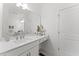 Bright bathroom featuring modern vanity with lots of counter space and a large mirror at 1245 S Blount Street # 201, Raleigh, NC 27601