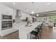 Bright, spacious kitchen featuring a large island with seating and modern appliances at 1245 S Blount Street # 201, Raleigh, NC 27601