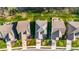 Aerial view of a neighborhood with well-manicured lawns and a mix of home exterior designs at 1301 Elliott Ridge Ln, Morrisville, NC 27560