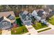 Overhead view of a neighborhood with green lawns and well-maintained homes at 1301 Elliott Ridge Ln, Morrisville, NC 27560