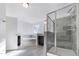 Modern bathroom featuring a glass-enclosed shower, separate soaking tub, and stylish tile accents at 1301 Elliott Ridge Ln, Morrisville, NC 27560