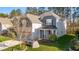 Charming two-story home with a landscaped front yard and inviting entrance at 1301 Elliott Ridge Ln, Morrisville, NC 27560