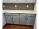 This kitchen features dark hardwood floors and mosaic tile backsplash at 1301 Elliott Ridge Ln, Morrisville, NC 27560