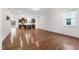 This living room has hardwood floors and lots of natural light at 1301 Elliott Ridge Ln, Morrisville, NC 27560