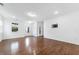 This living room has hardwood floors and lots of natural light at 1301 Elliott Ridge Ln, Morrisville, NC 27560