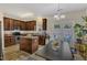 Well-equipped kitchen with dark wood cabinets, stainless steel appliances, and backyard access at 1304 Cozart St # 258, Durham, NC 27704