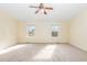 Bright bedroom with neutral walls, carpet flooring, and plenty of space at 1311 Canyon Rock Ct # 105, Raleigh, NC 27610