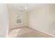 Bright bedroom with a ceiling fan and a neutral color scheme at 1311 Canyon Rock Ct # 105, Raleigh, NC 27610